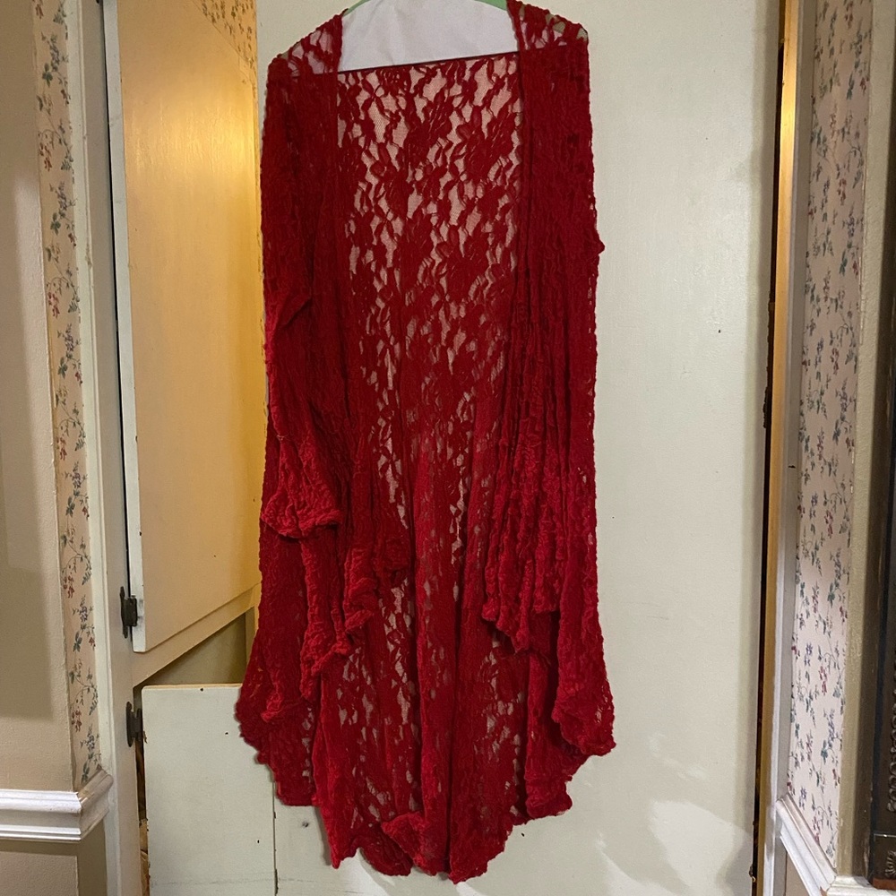Dress up any outfit with this beautiful red lace kimono.